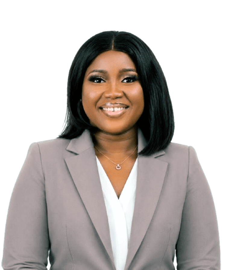 Professional portrait of a smiling woman in a light gray blazer and white blouse, facing the camera.